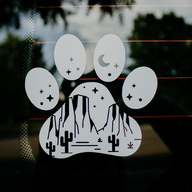 Decals desert paw print sticker showing a tan paw print with desert-inspired colors on a white background.