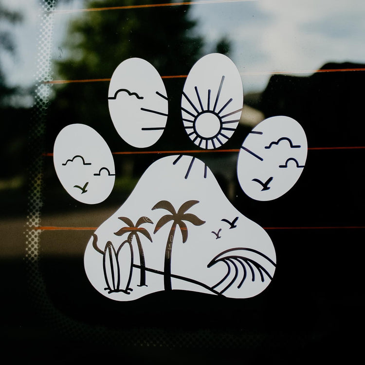 Decals Beach Paw Print sticker with realistic paw print design on a white background, ideal for decorating beach-themed items.