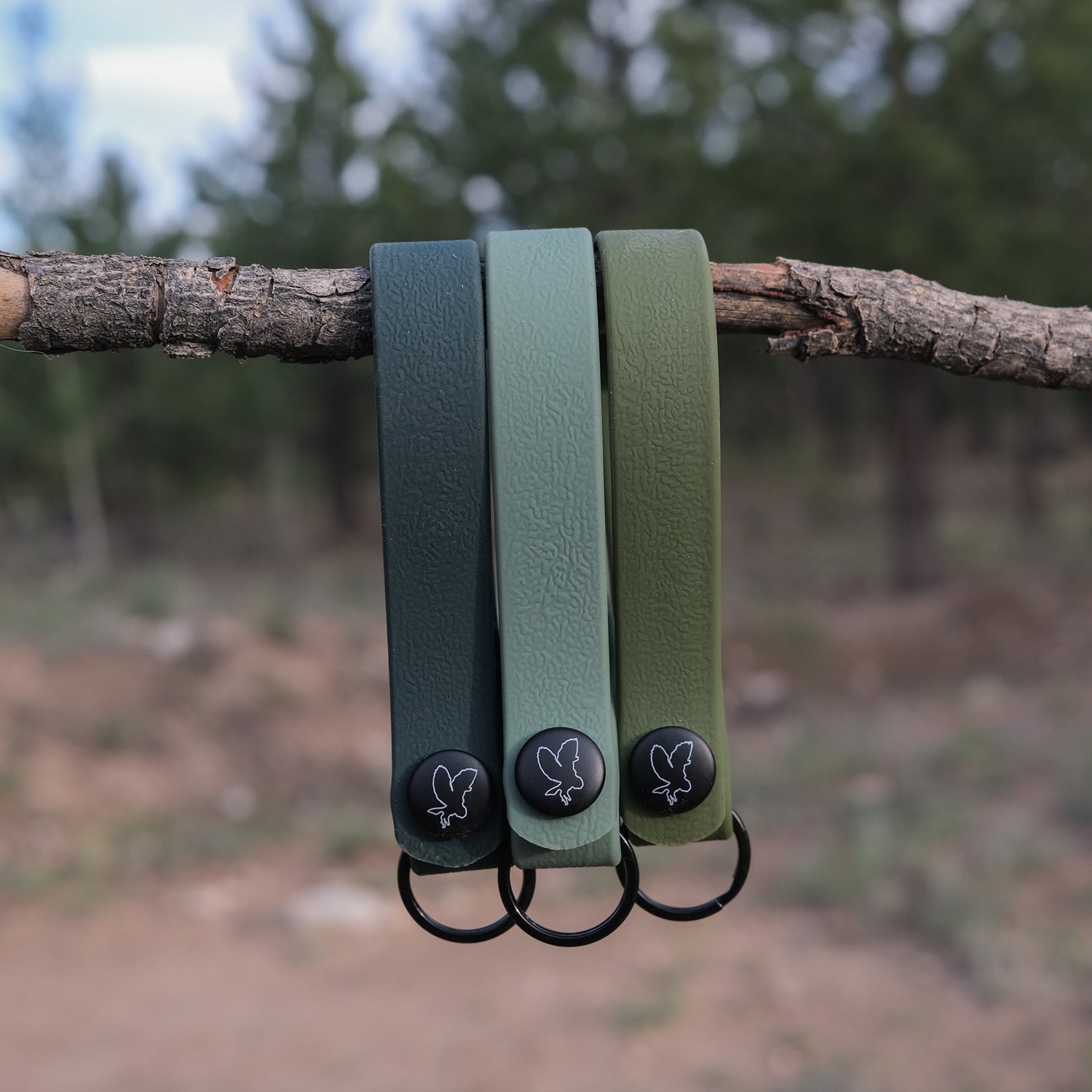 Green split ring loop jewelry component by Hoot & Co, showing a close-up of the circular metal loop for crafting accessories.